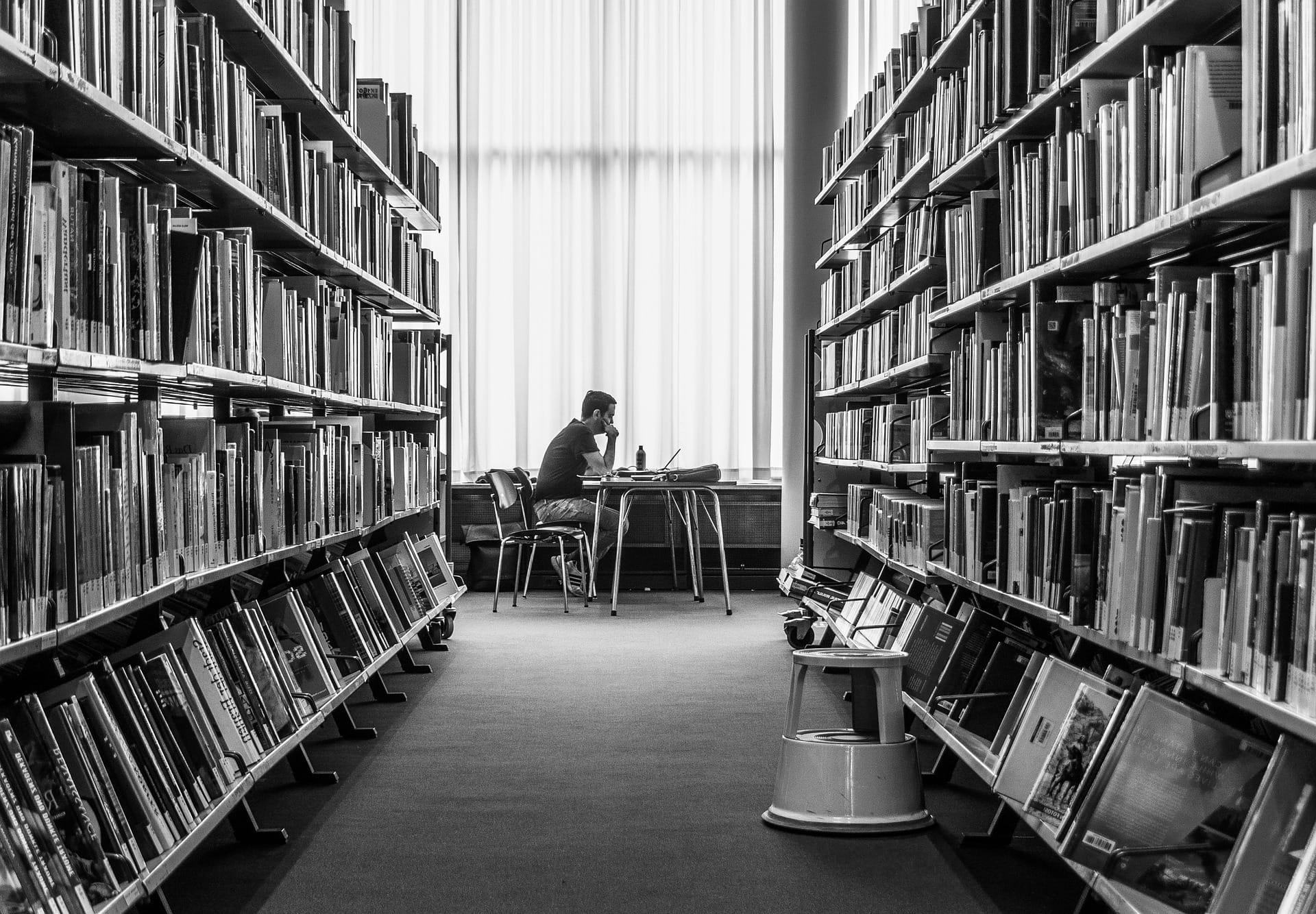 man in library